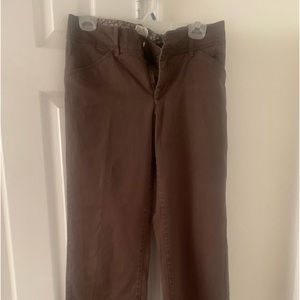 Brown pants. Clasp and button to close.